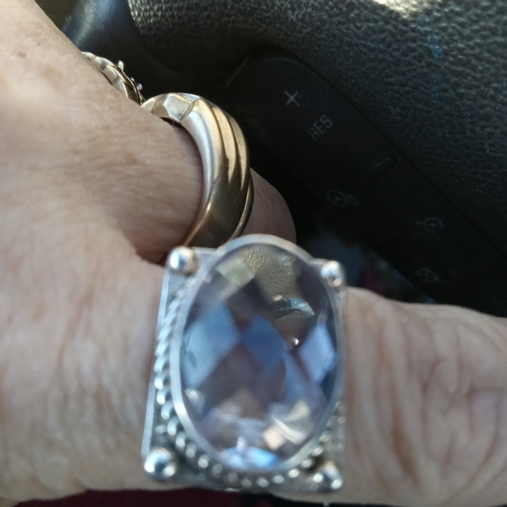 Sterling Silver Women's Amethyst oval facet stone. Setting is customer designed